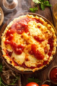 Fresh cottage cheese pizza bowl with melted cheese and marinara