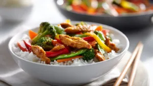 optipic a bowl of colorful chicken and vegetable